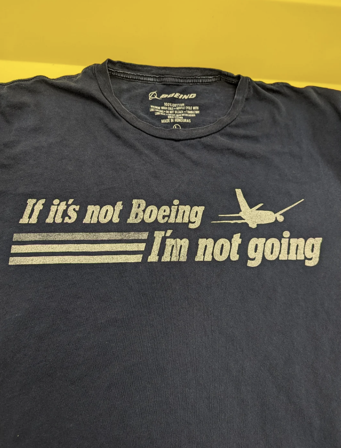 Black T-shirt with text &quot;If it&#x27;s not Boeing, I&#x27;m not going&quot; and silhouette of an airplane
