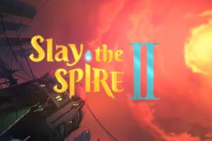 ゲーム「Slay the Spire II」のロゴが炎と岩に囲まれた背景に表示されています。