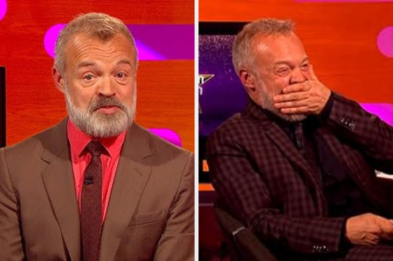 Graham Norton wearing a suit hosting a show, sitting and laughing with guests off-camera
