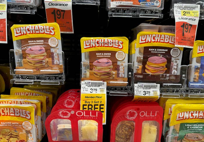 Lunchables products on a store shelf with price tags, promotional offer &quot;Buy 3 Get 2 Free&quot; visible