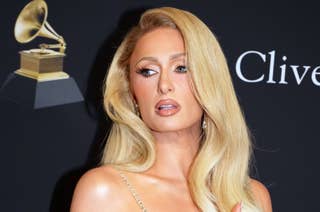 Paris Hilton poses in a glamorous outfit at a Grammy event