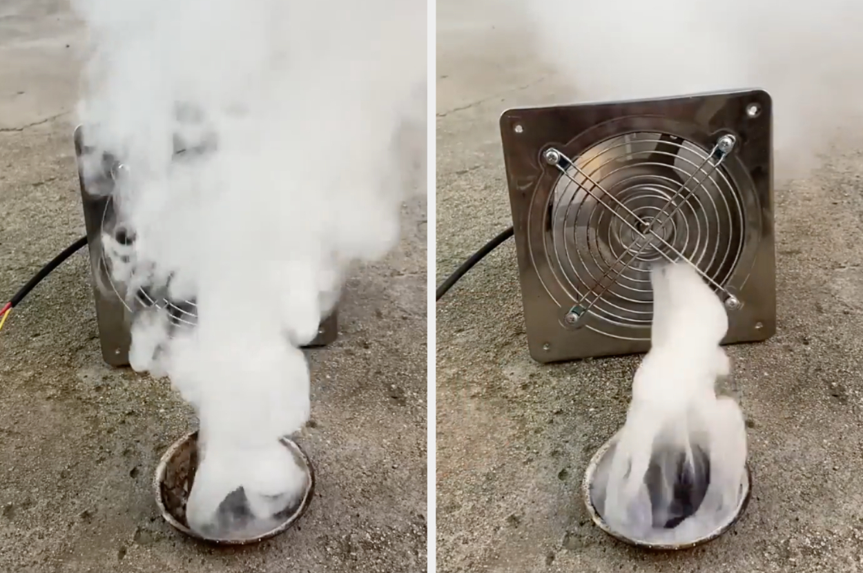 Fan blowing white smoke through a metal floor vent