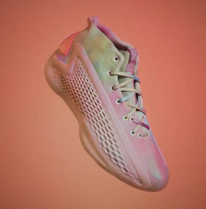Close-up of a sneaker with an ombré design and a mesh upper