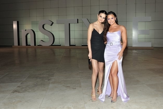 Demi and Selena posing together at the InStyle event