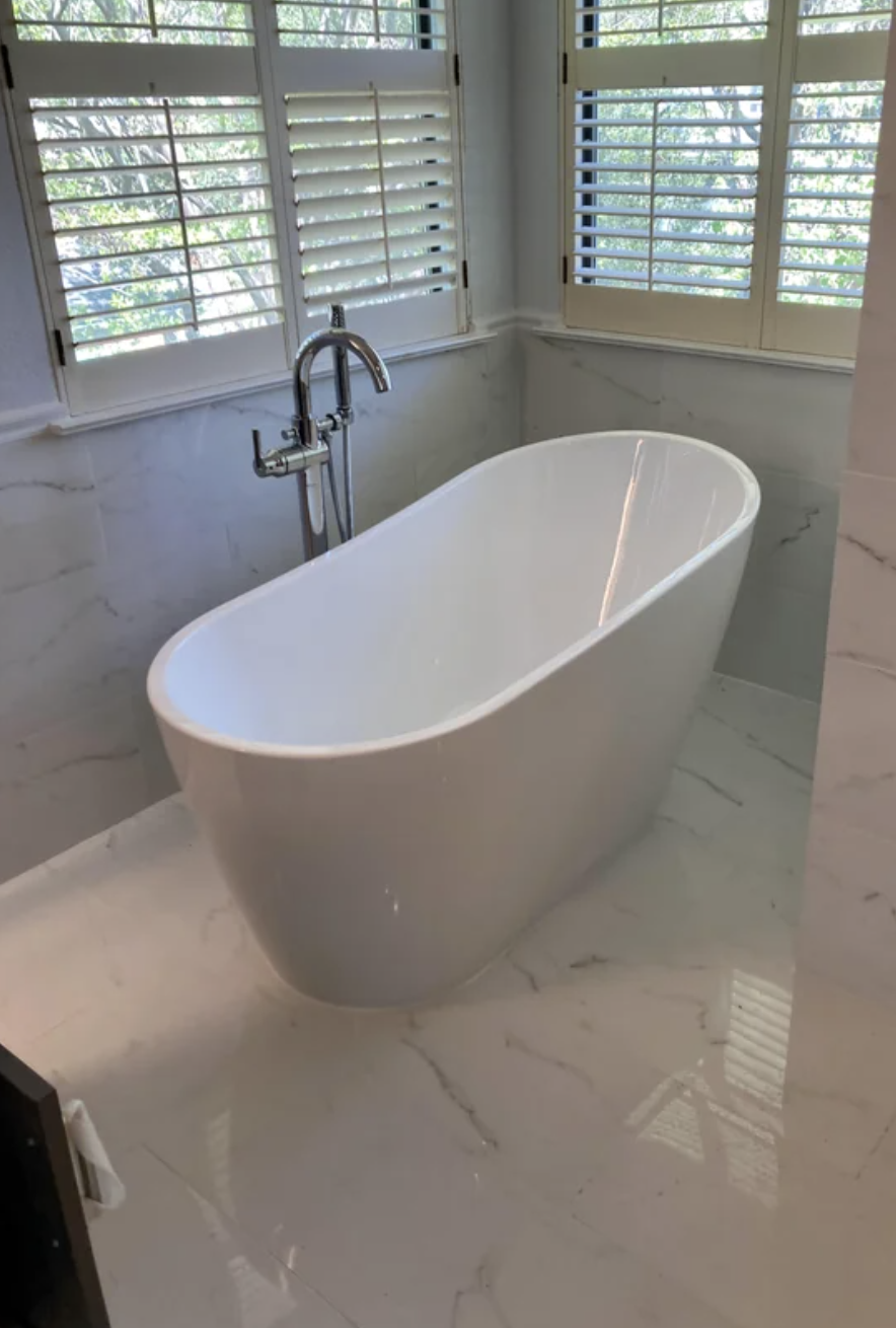Bathroom with a freestanding bathtub near a window, with title &quot;Yet another freestanding tub install.&quot;