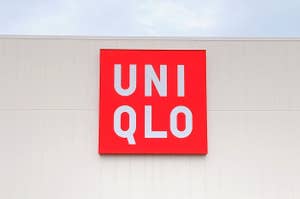 Sign with "UNIQLO" logo on store facade
