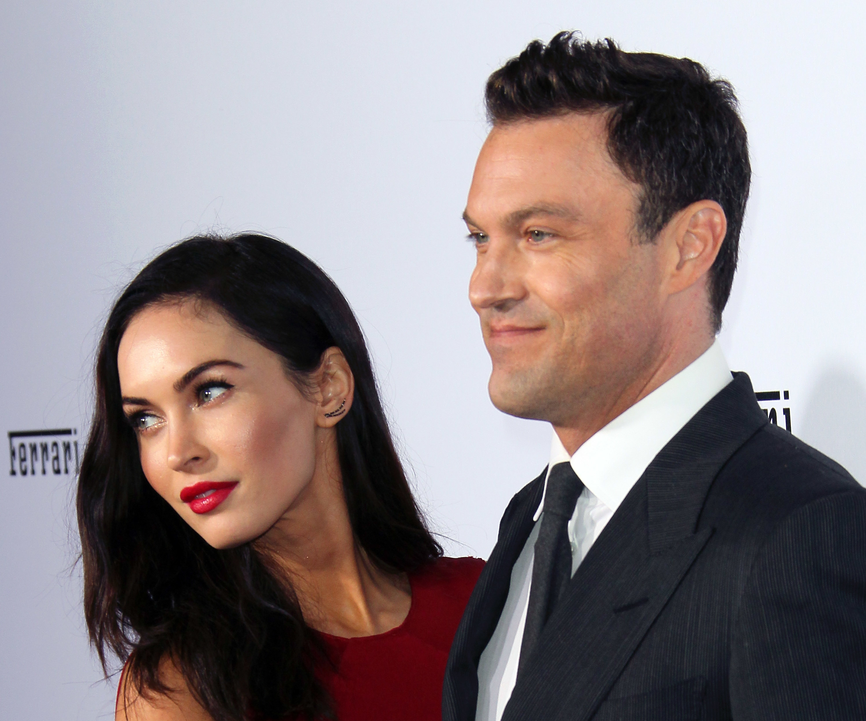 Closeup of Megan Fox and Brian Austin Green on the red carpet