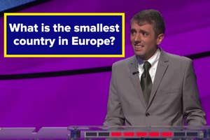 A game show contestant stands at the podium with a question displayed: "What is the smallest country in Europe?"