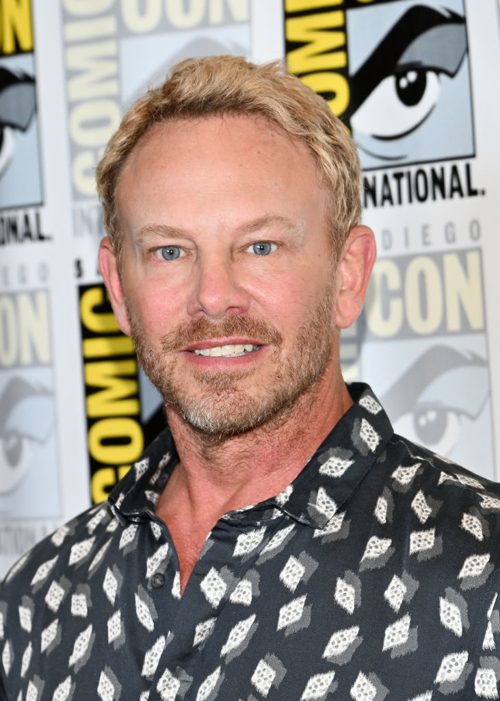 Ian Ziering in patterned shirt poses at San Diego Comic-Con event