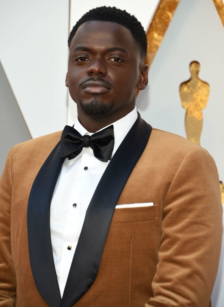 Daniel Kaluuya in a classic tuxedo with a bow tie at an awards event