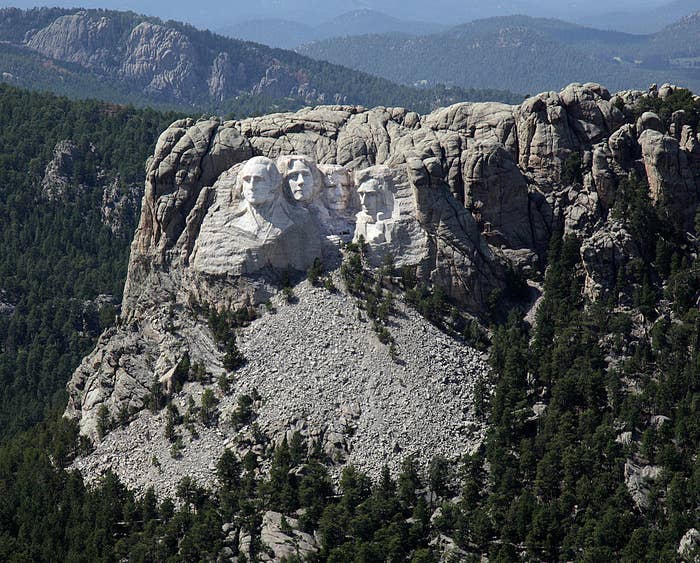 Mount Rushmore National Memorial depicting four US presidents carved into rock face