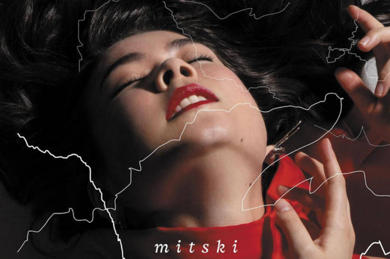 Mmitski appears blissful with eyes closed on the cover of her "Laurel Hell" album.