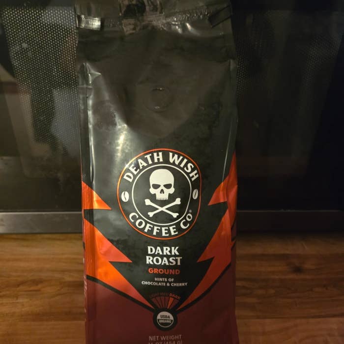 reviewer&#x27;s bag of Death Wish Coffee Co. dark roast ground coffee with skull logo