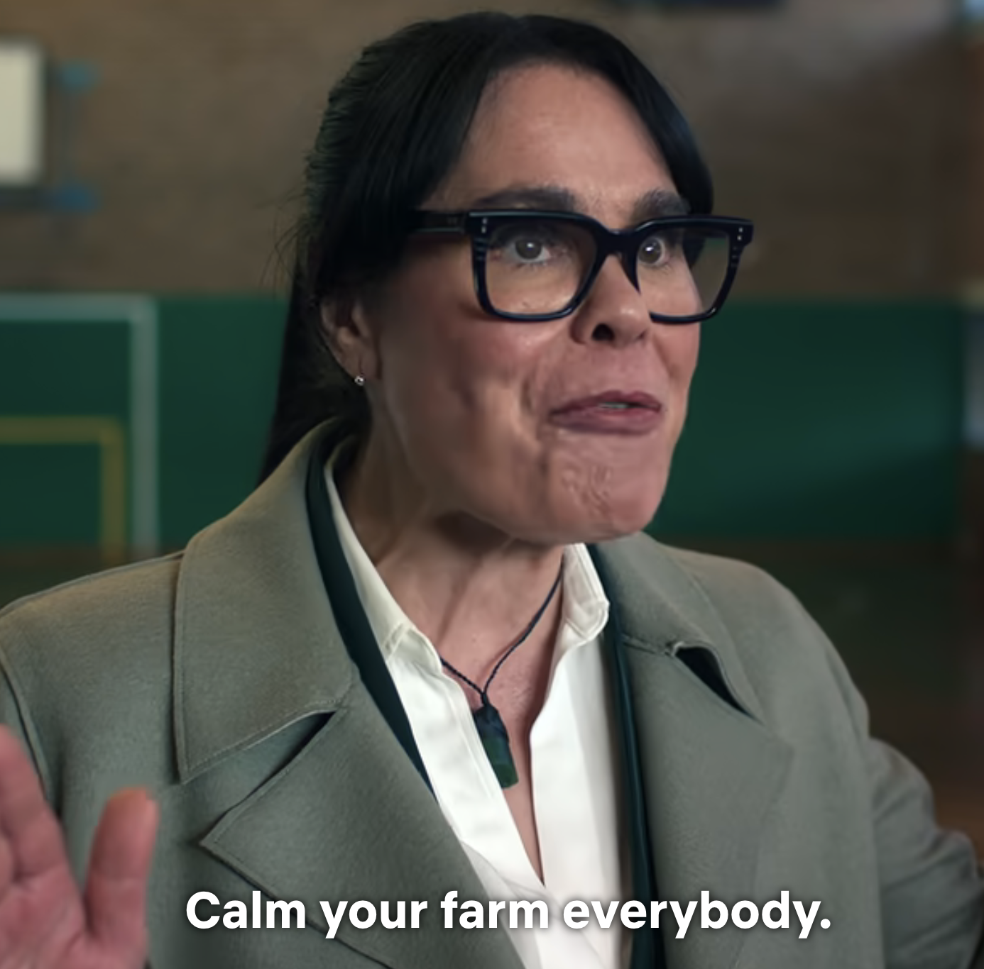 Woman in glasses gesturing with a caption &quot;Calm your farm everybody.&quot;