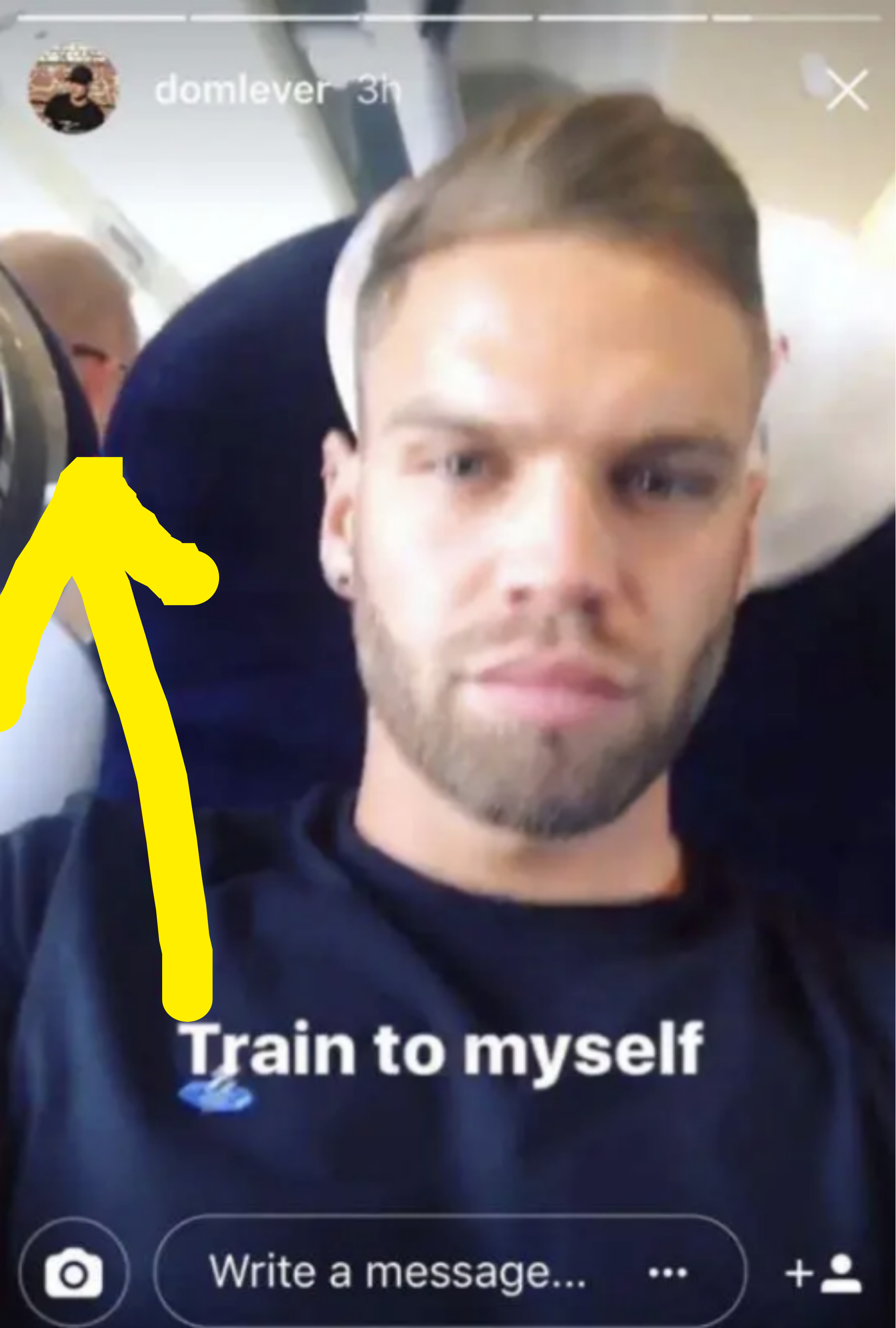 Dom taking a selfie on an empty train with text overlay &quot;Train to myself&quot;