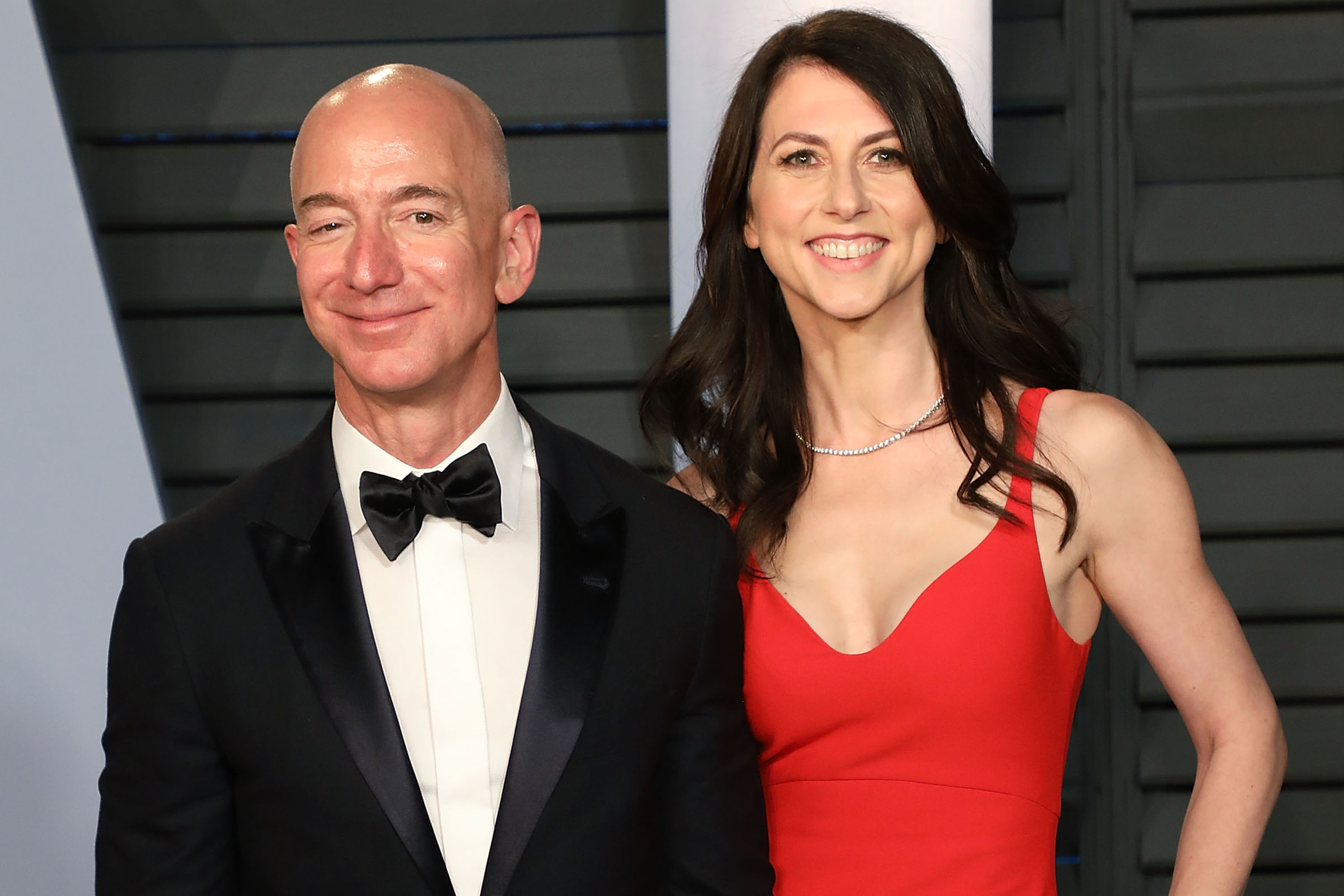 Amazon CEO Jeff Bezos (L) and MacKenzie Bezos attend the 2018 Vanity Fair Oscar Party