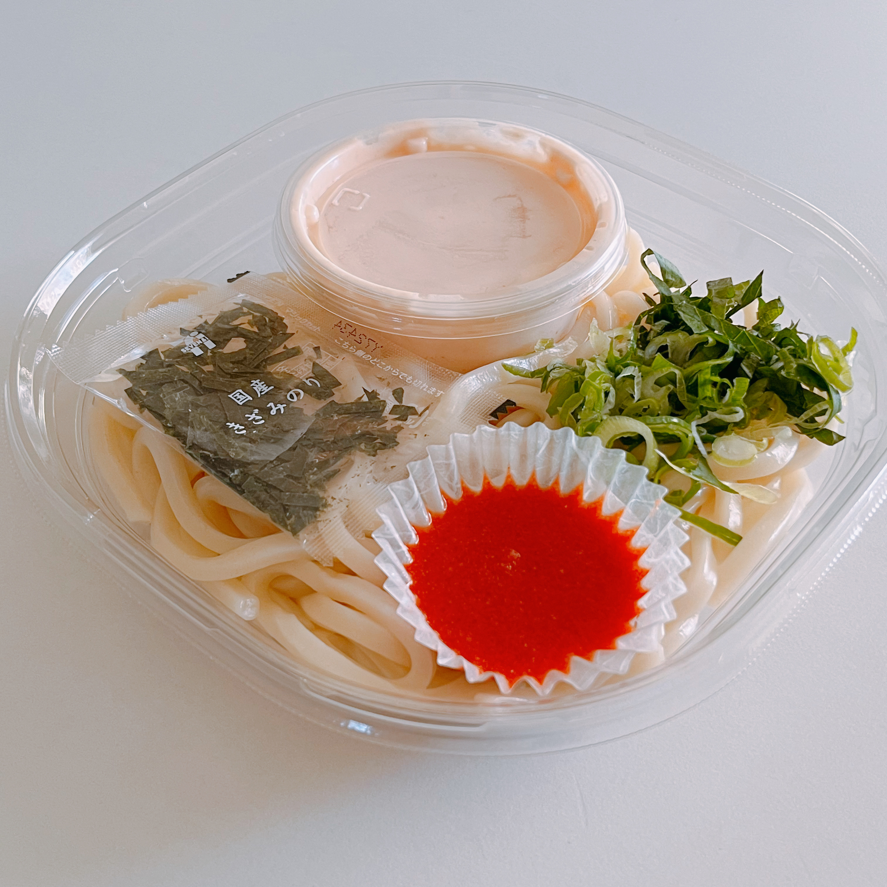 セブンイレブンのおすすめ弁当「明太クリームうどん」