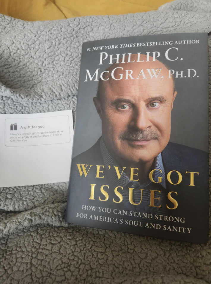 Book &quot;Life Code&quot; by Phillip C. McGraw, with a note saying &quot;A gift for you&quot;