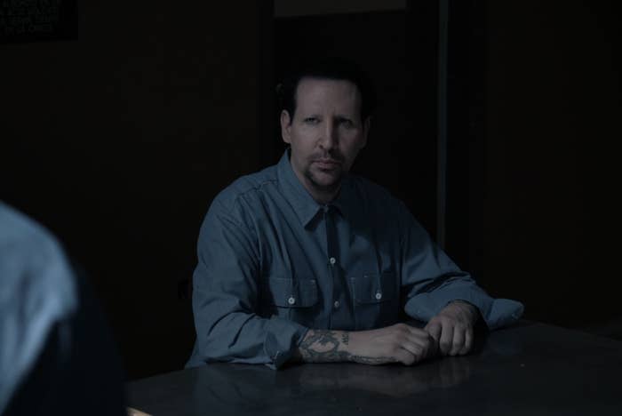 Marilyn Manson sitting at a table in Sons of Anarchy