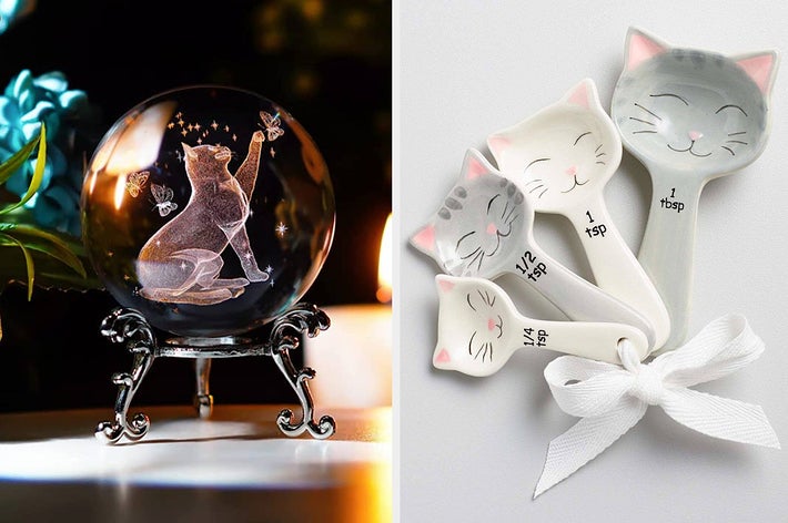 a crystal ball laser engraved with a cat / cat shaped measuring spoons