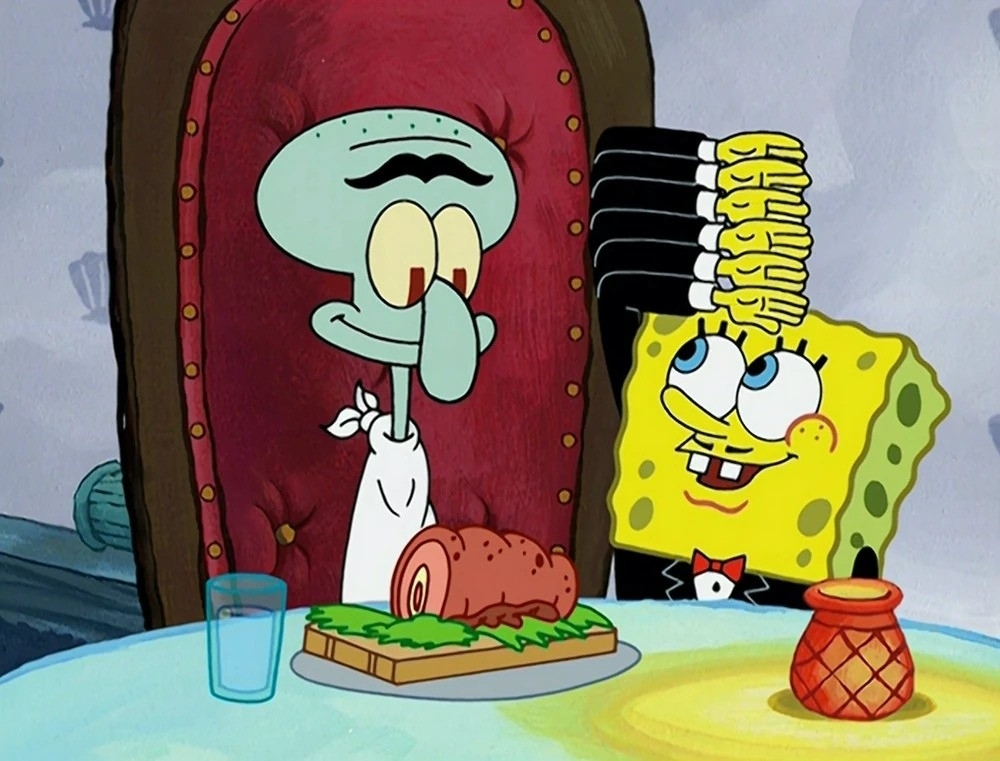 Squilliam and SpongeBob at a table, a meal in front