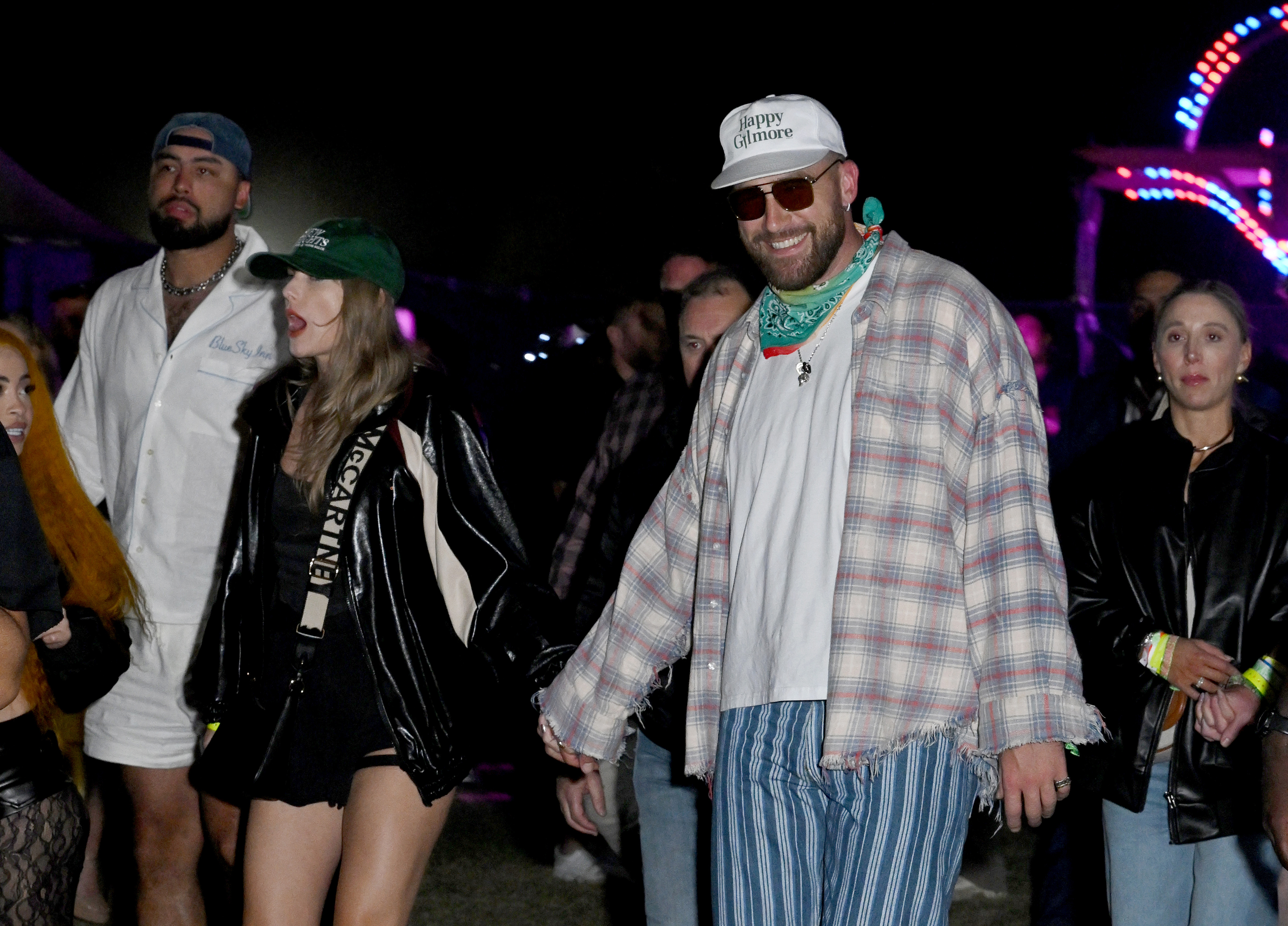 Taylor Swift and Travis Kelce at Coachella holding hands