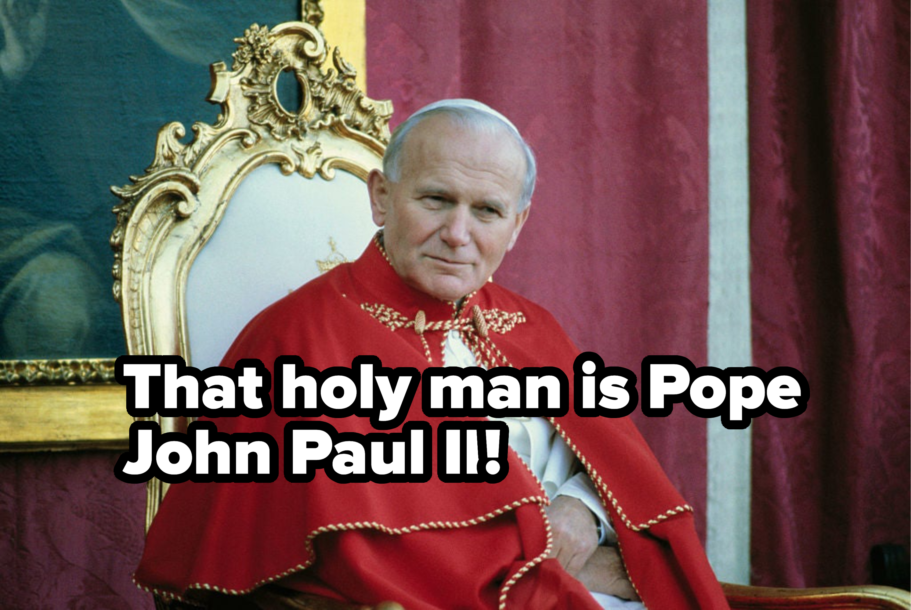 Pope John Paul II seated in gold-trimmed chair, wearing white cassock and red papal mozzetta