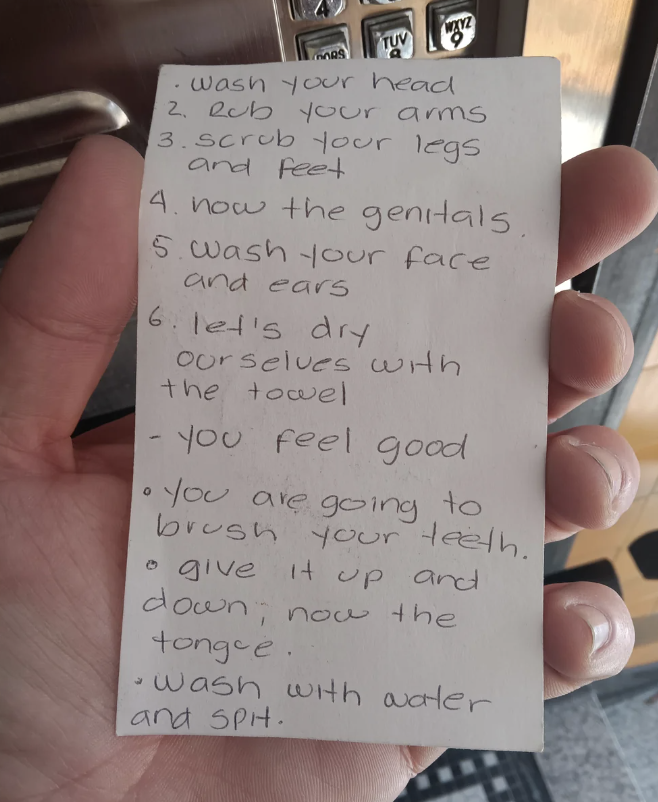 Handwritten note listing steps for personal hygiene routines