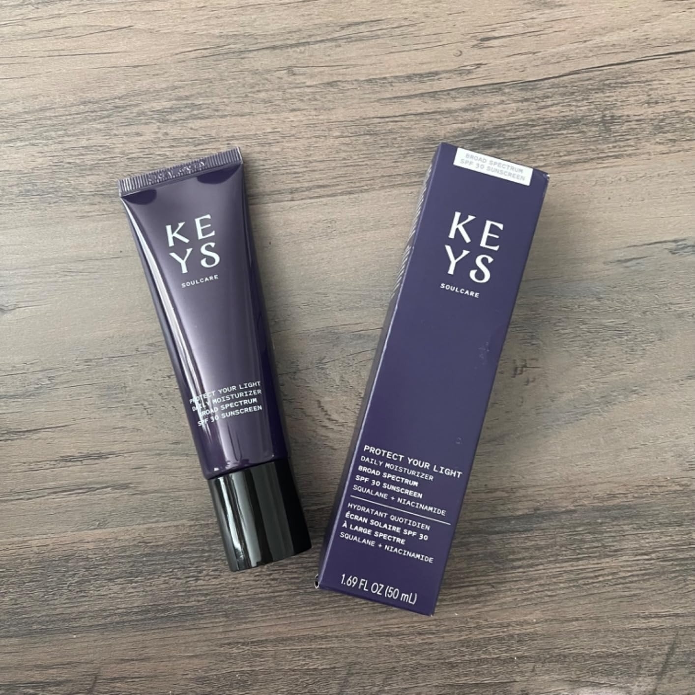 Two products from KEYS Soulcare line, Protect Your Light SPF lotion with packaging