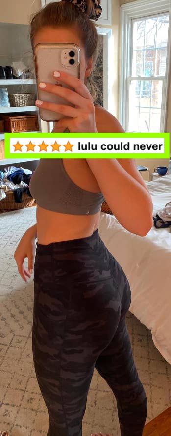 reviewer showing off booty in camo print leggings