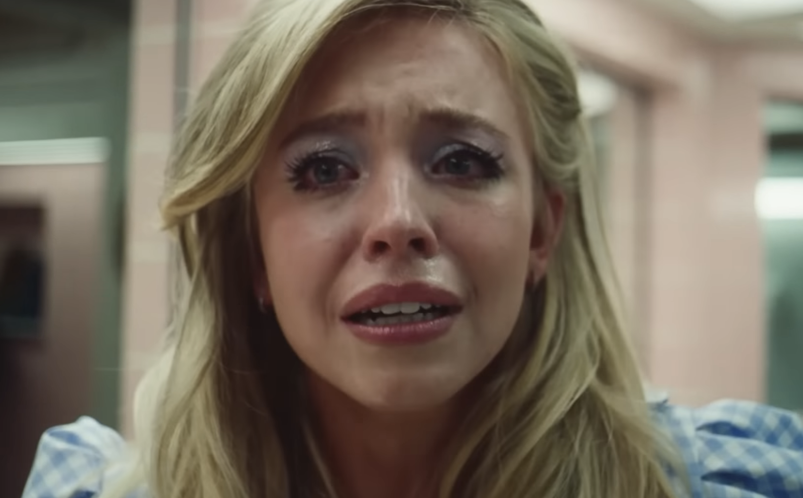 Screenshot from &#x27;Euphoria&#x27; showing a distressed character, Cassie, with tear-filled eyes