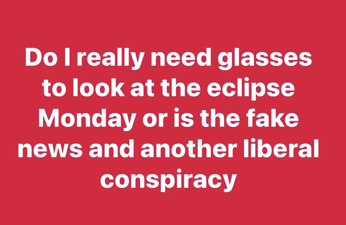 Text questioning the necessity of glasses for eclipse viewing, with a skeptical tone towards news
