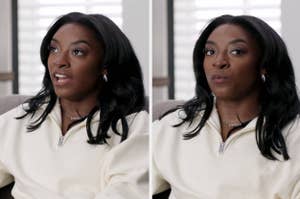 Simone Biles in an interview, wearing a white crewneck with "Owens" on the collar, looking expressive