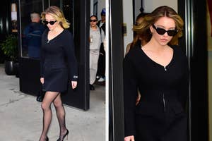 Woman in a chic black dress and sunglasses exiting a building