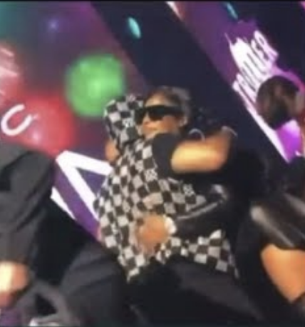 Nelly and Ashanti embracing