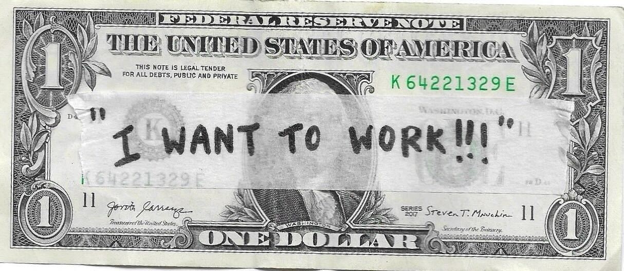 Text on a dollar bill reads &quot;I WANT TO WORK!!!&quot; in handwritten capital letters