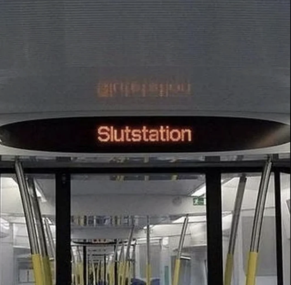 Electronic sign displaying &quot;Slutstation&quot;, meaning end station in Swedish, at a train or bus station