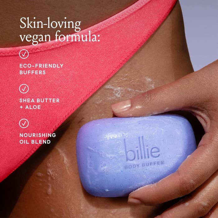 Close-up of a hand holding a Billie body buffer soap bar against skin, highlighting eco-friendly and nourishing ingredients