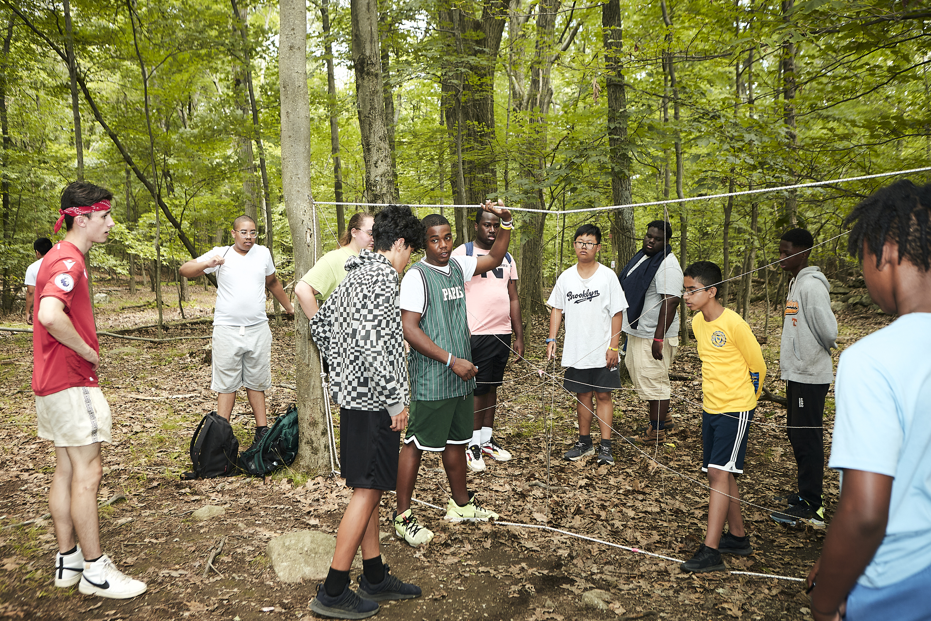 Group of people participating in an outdoor team-building activity