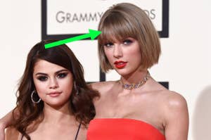 Selena Gomez and Taylor Swift at a Grammy event, Selena in a blue dress and Taylor in a red one