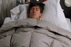 Cameron from Ferris Bueller's Day Off lying in bed