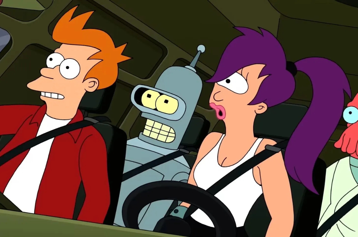 Fry, Leela, and Bender from Futurama are in a vehicle looking shocked. Leela is driving