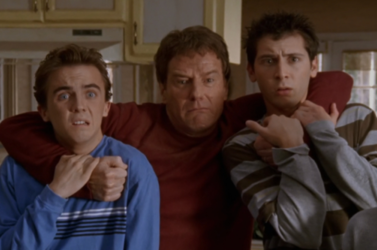 Three male actors from &quot;Malcolm in the Middle&quot; show expressive concern, sitting closely together