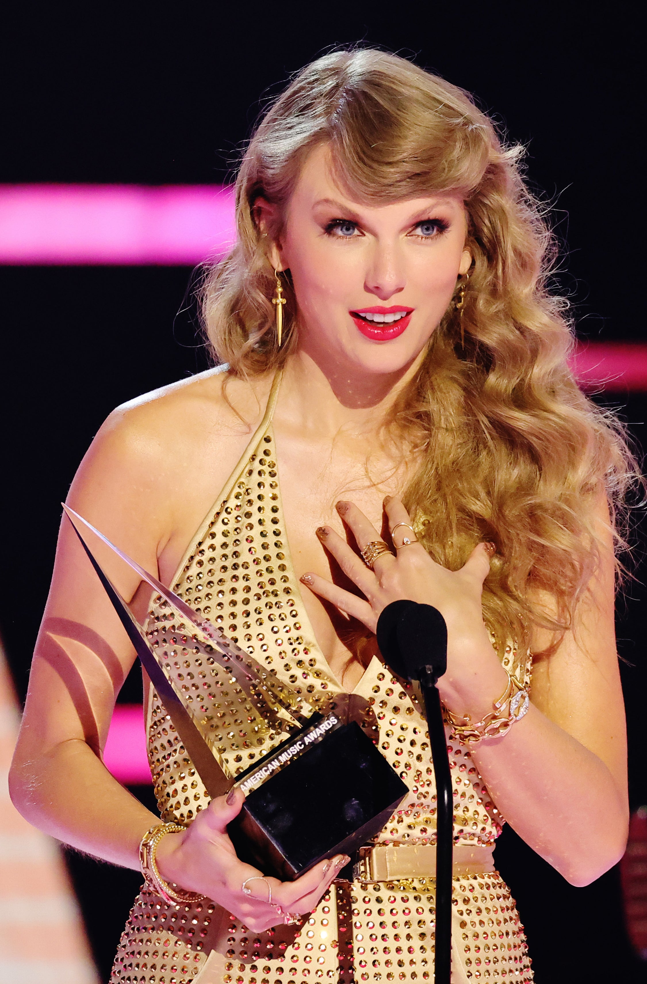 Taylor Swift on stage accepting an award