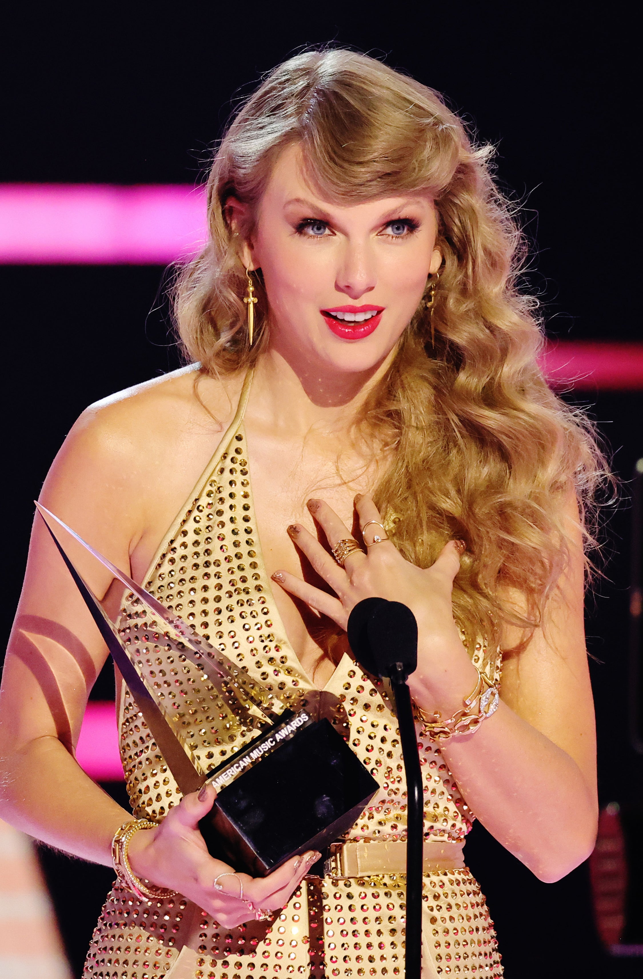 Taylor Swift on stage accepting an award