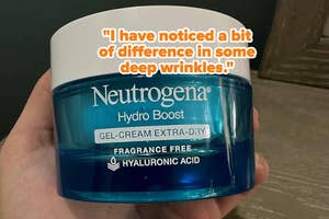 Hand holding a jar of Neutrogena Hydro Boost Gel-Cream for extra-dry skin with a text testimonial above it