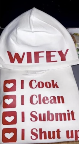 An apron with &quot;WIFEY&quot; and checklist including cooking, cleaning, submitting, and staying quiet