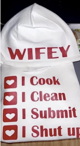 An apron with &quot;WIFEY&quot; and checklist including cooking, cleaning, submitting, and staying quiet