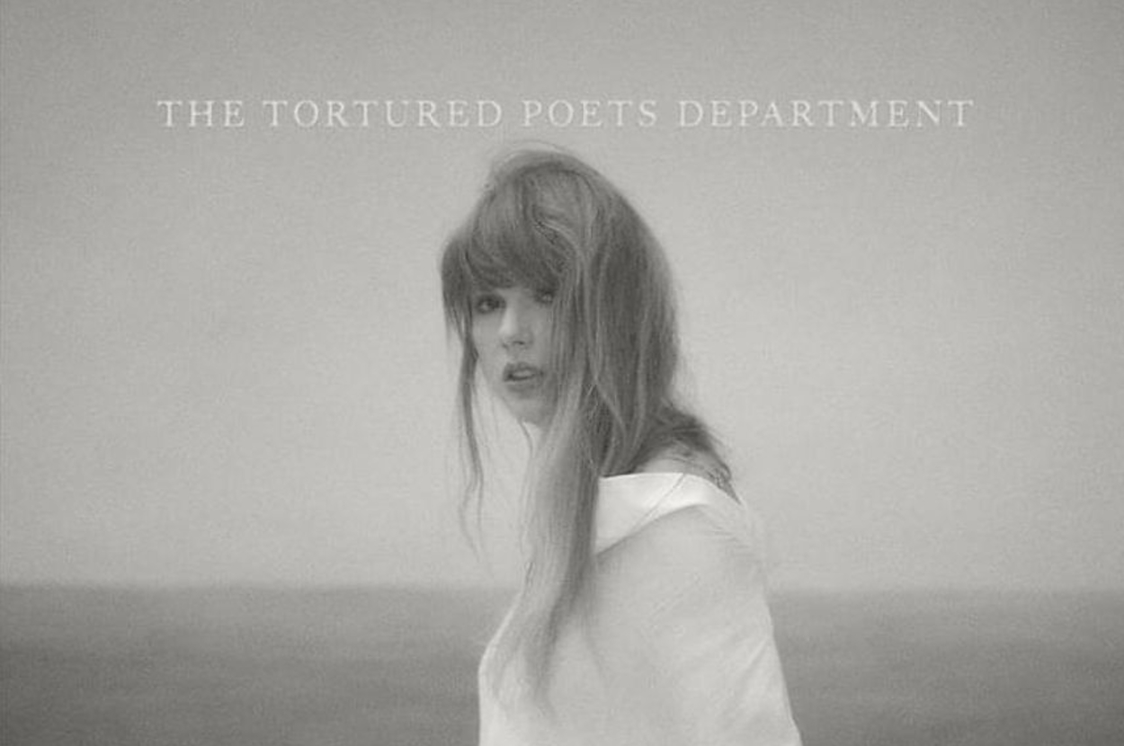 Image of a Taylor Swift with hair messy around her face with text reading "THE TORTURED POETS DEPARTMENT"