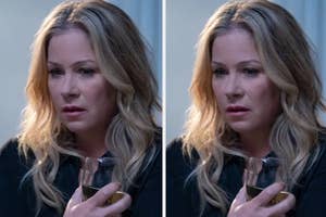 Christina Applegate as seen in "Dead To Me" holding a glass of wine, looking upset and demure